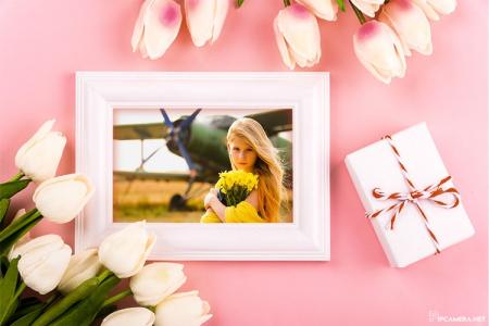 Photo frames with flower and gift box for March 8
